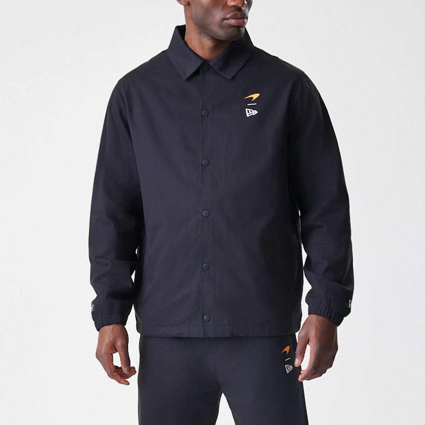 The Male model is wearing McLaren Racing McLaren Black Coaches Jacket 6
