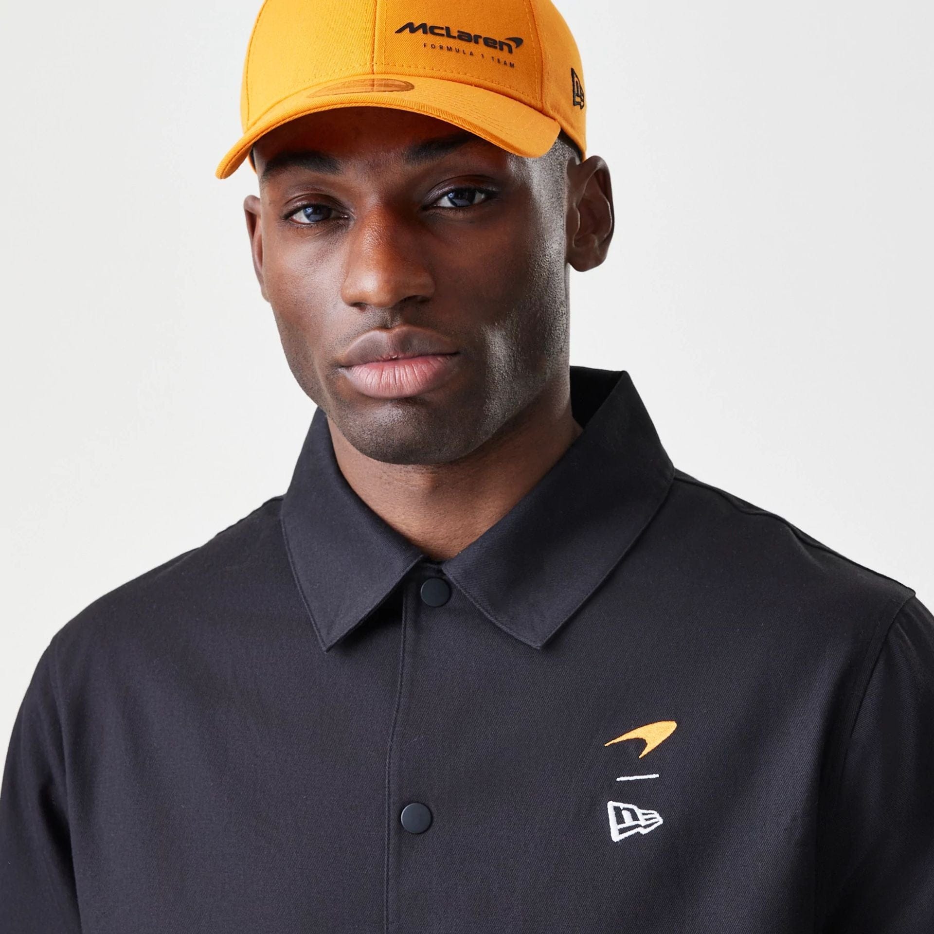 The Male model is wearing McLaren Racing McLaren Black Coaches Jacket 4