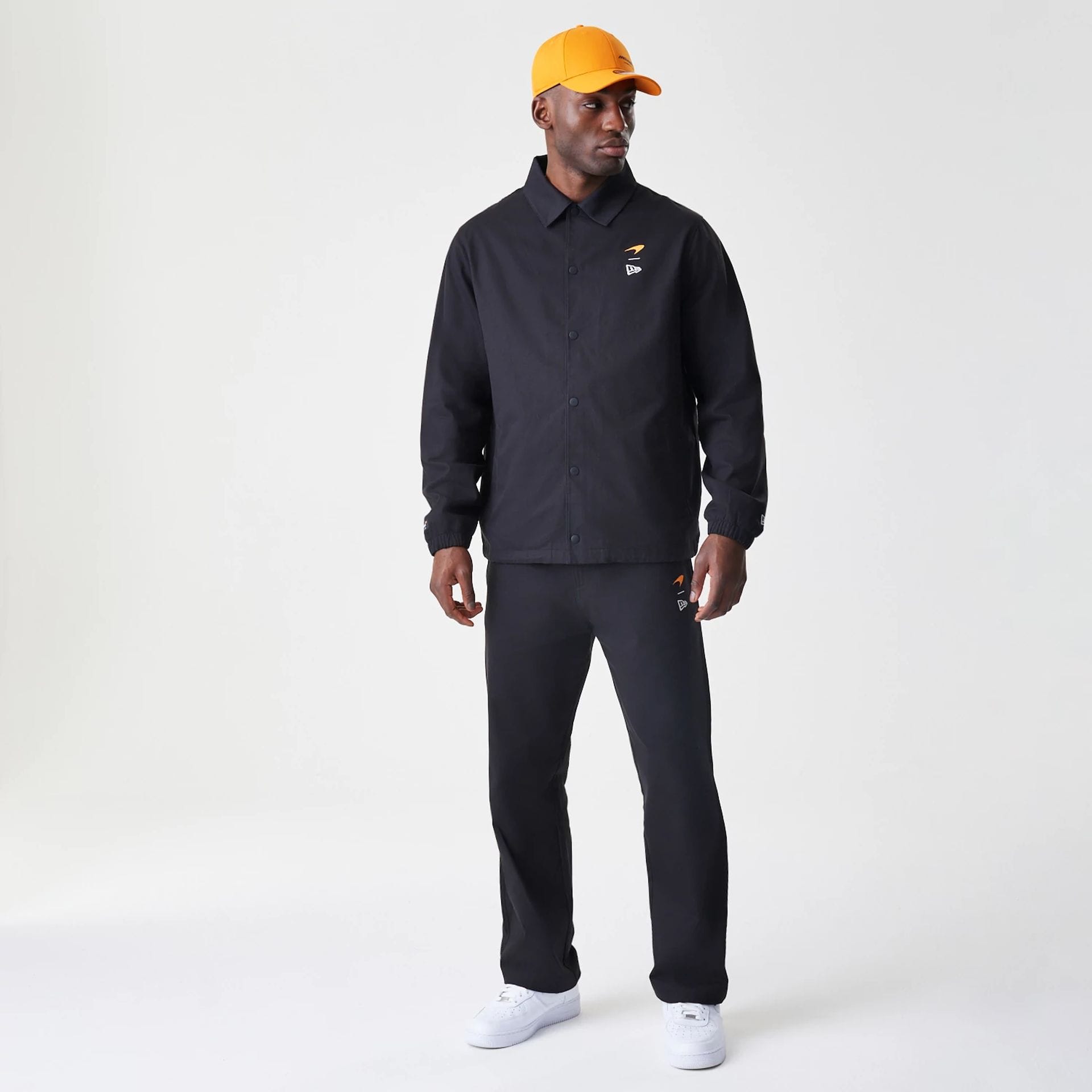 The Male model is wearing McLaren Racing McLaren Black Coaches Jacket 8