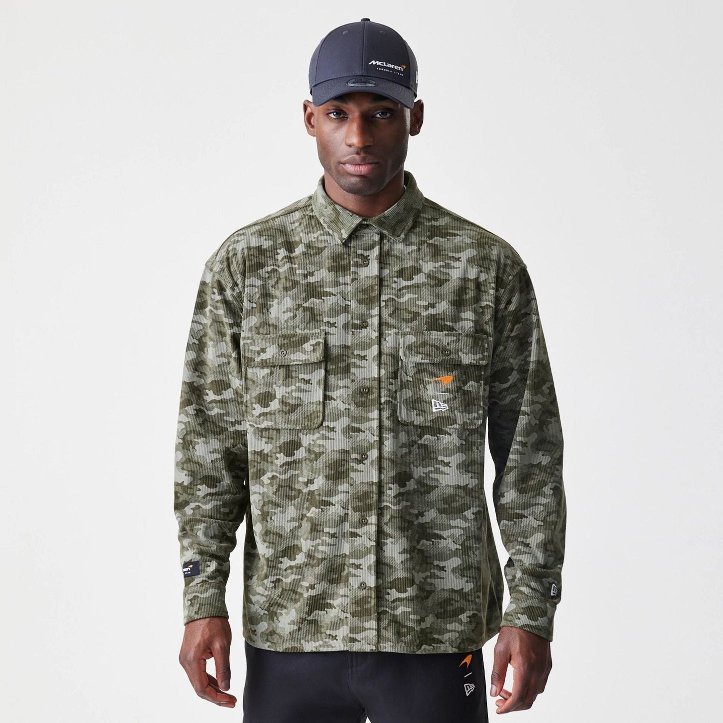 The Male model is wearing McLaren Racing Graphic Green Long Sleeve Shirt  1