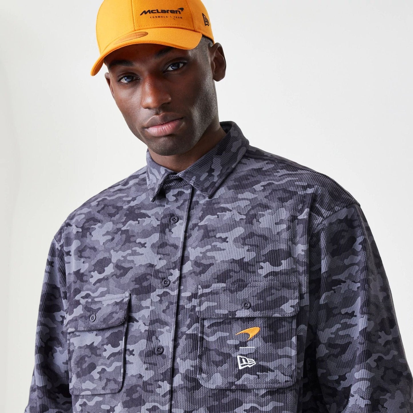 The Male model is wearing McLaren Racing Graphic Dark Grey Long Sleeve Shirt  4