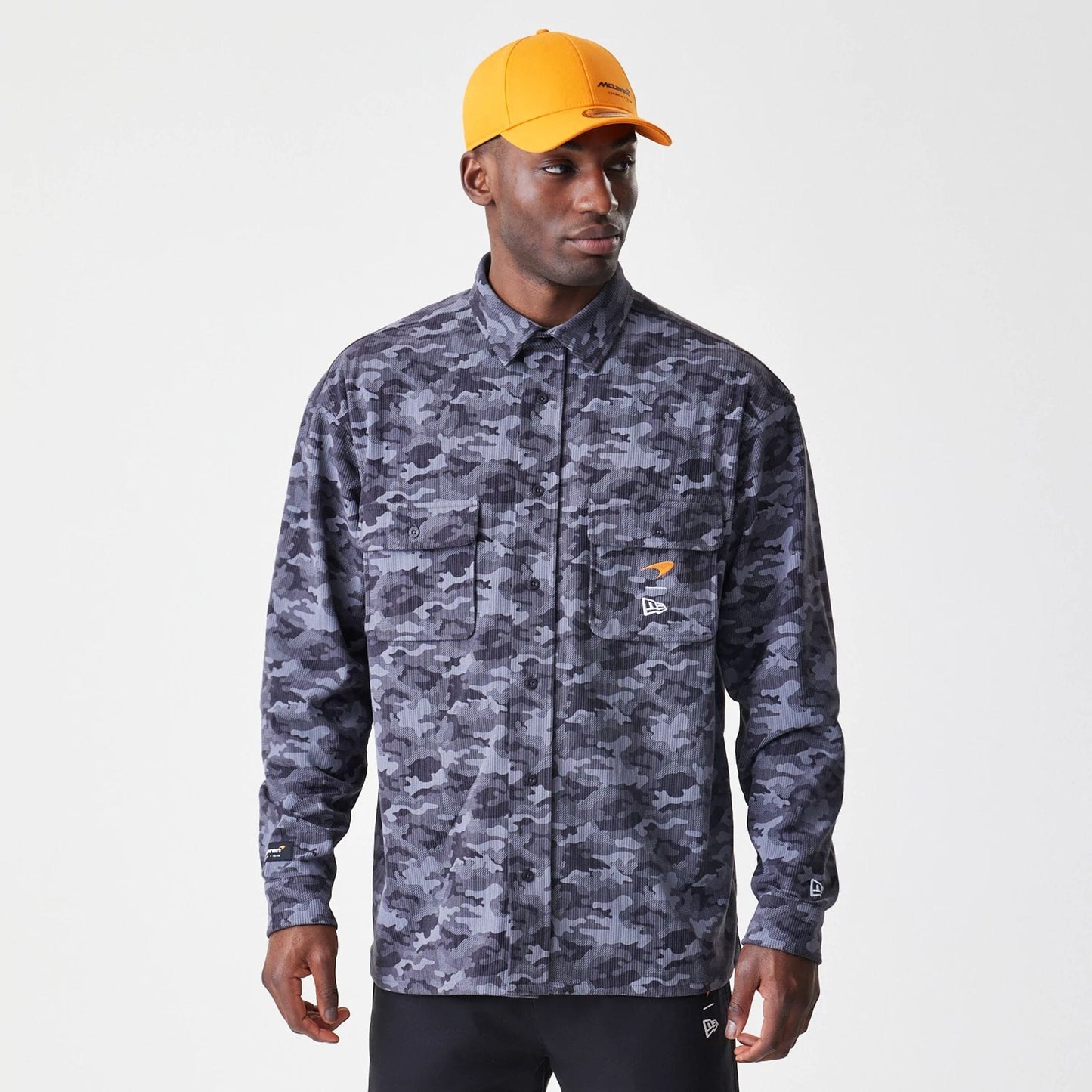 The Male model is wearing McLaren Racing Graphic Dark Grey Long Sleeve Shirt 8