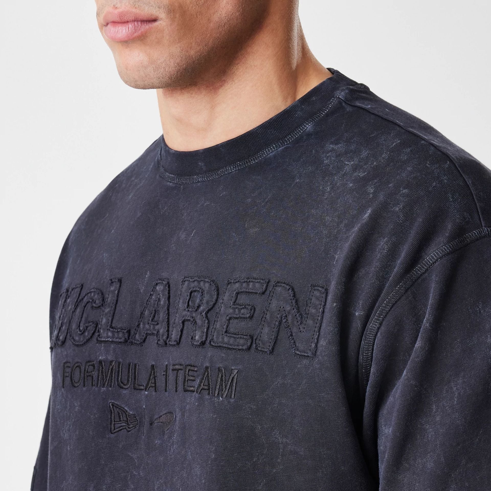 The Male model is wearing McLaren Racing Washed Black Oversized T-Shirt  3