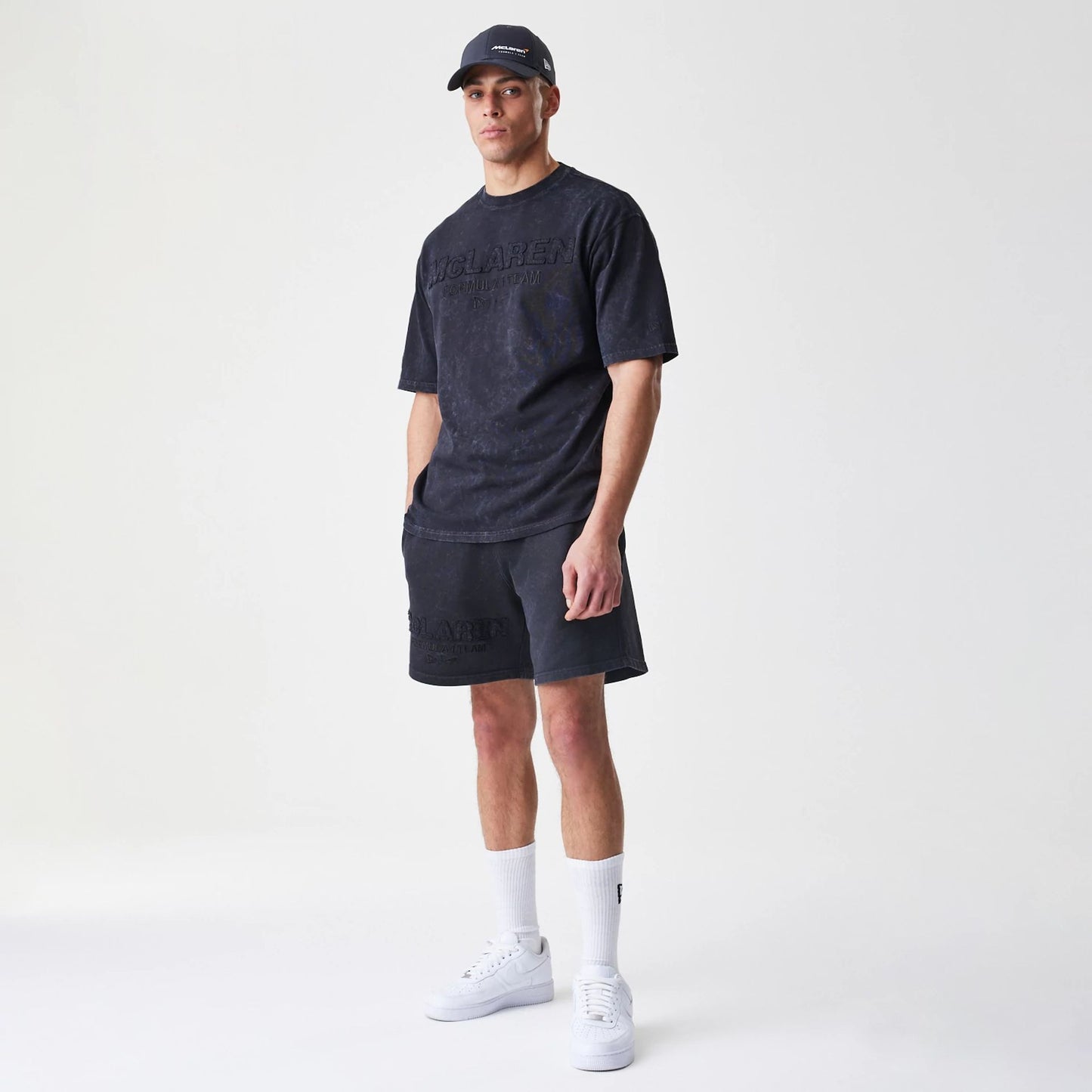 The Male model is wearing McLaren Racing Washed Black Oversized T-Shirt  8