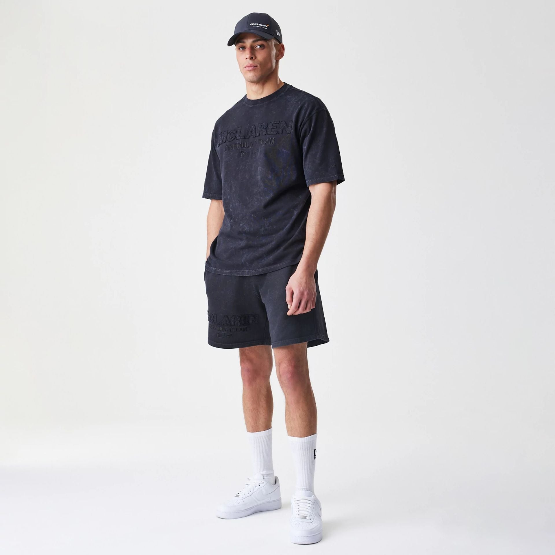 The Male model is wearing McLaren Racing Washed Black Oversized T-Shirt  8