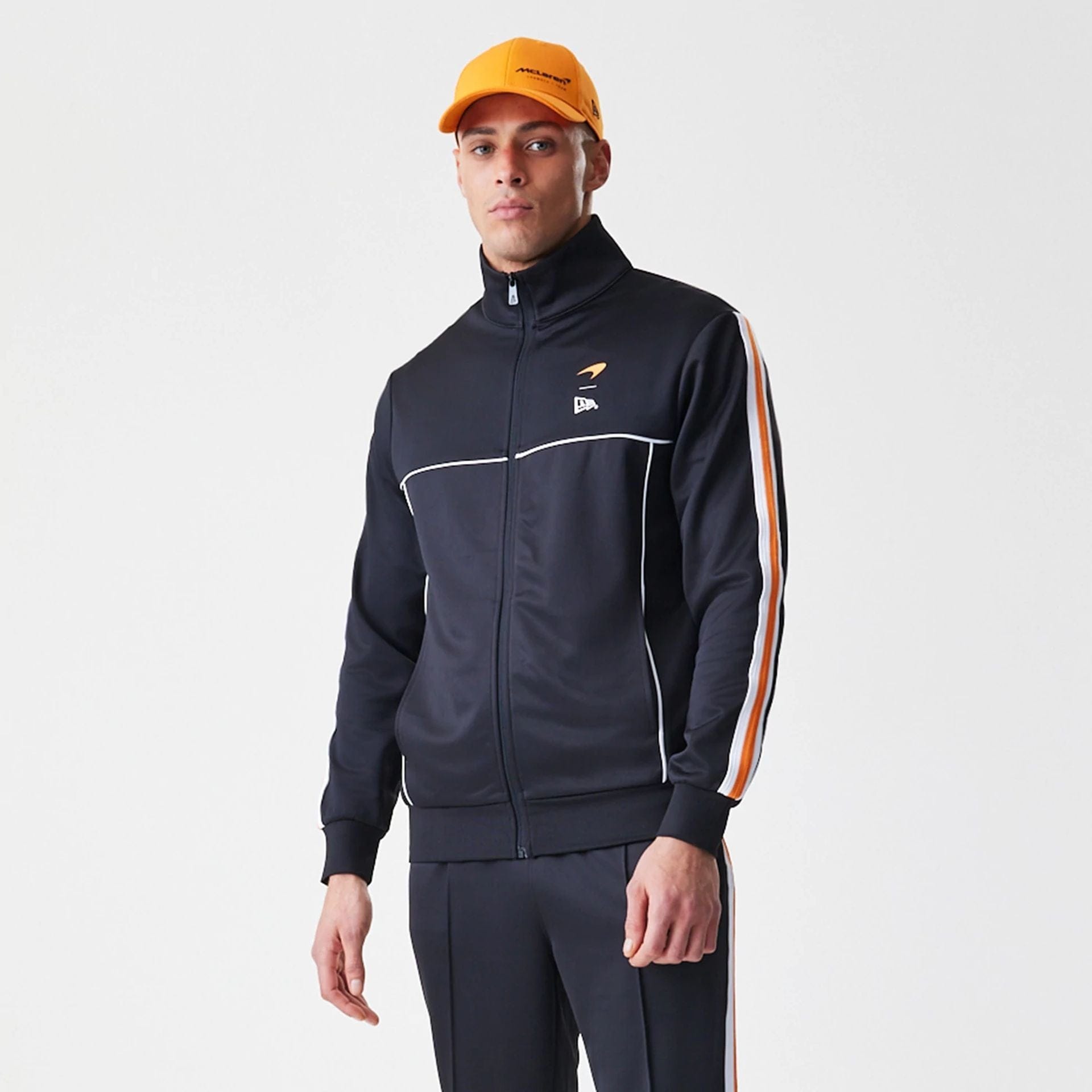 The Male model is wearing McLaren Racing Poly Black Track Jacket  3