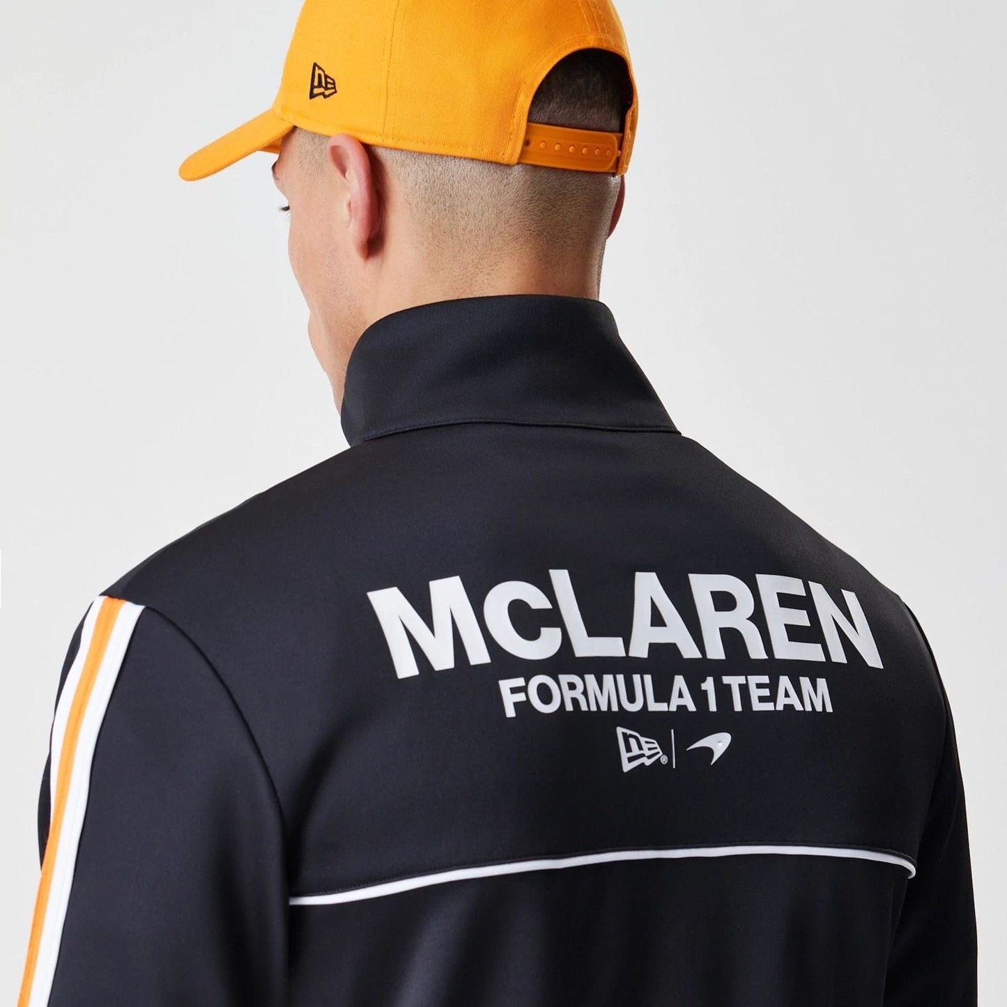 The Male model is wearing McLaren Racing Poly Black Track Jacket  5