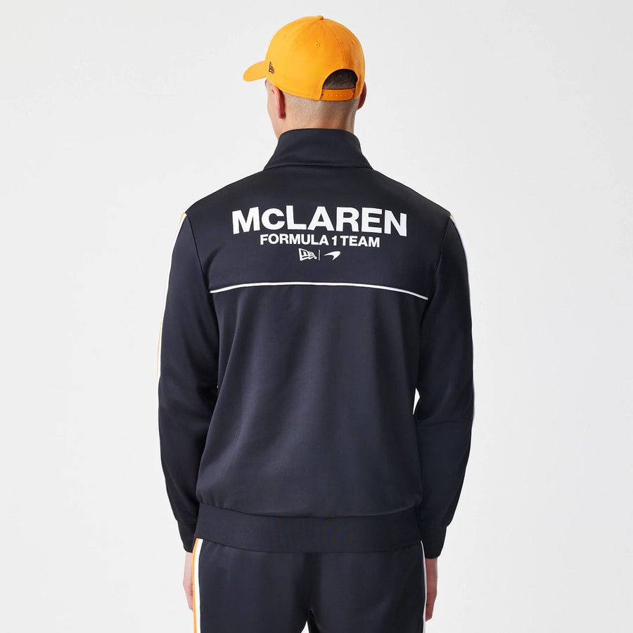 The Male model is wearing McLaren Racing Poly Black Track Jacket  2