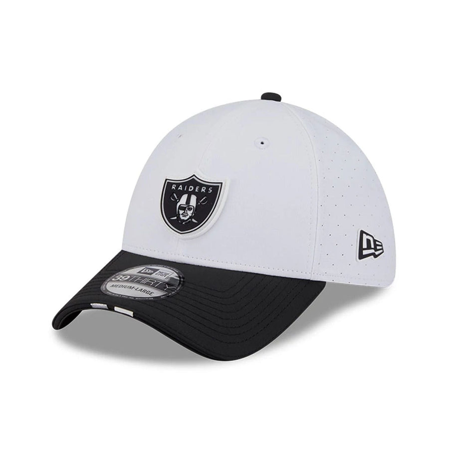 This is a Las Vegas Raiders NFL Training 2025 White 39THIRTY Stretch Fit Cap 1