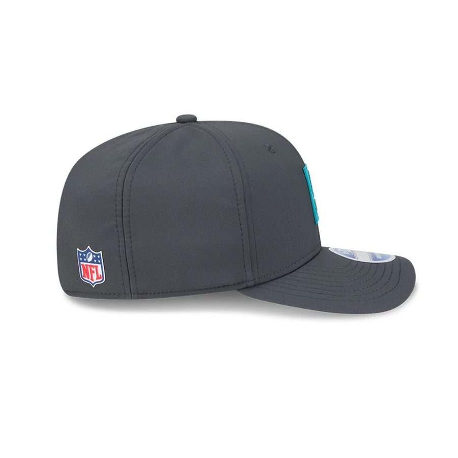 This is a Miami Dolphins NFL Sideline 2025 Charcoal 9SEVENTY Stretch Snap Adjustable Cap 5