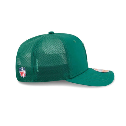 This is a New York Jets NFL Sideline 2025 Green 9SEVENTY Trucker Stretch Snap Adjustable Cap 5