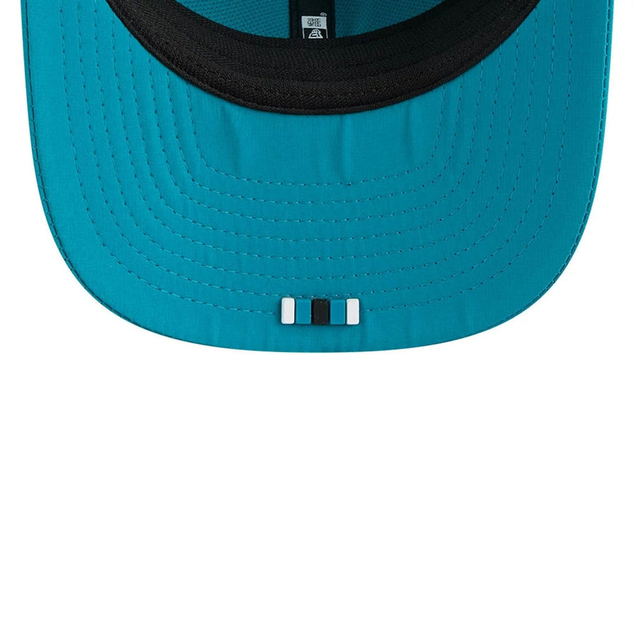 This is a Jacksonville Jaguars NFL Sideline 2025 Turquoise 9SEVENTY Trucker Stretch Snap Adjustable Cap 7