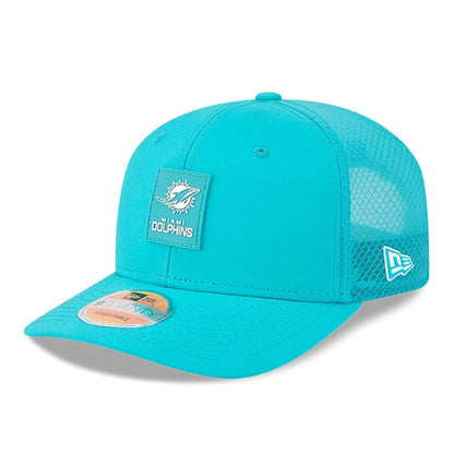 This is a Miami Dolphins NFL Sideline 2025 Turquoise 9SEVENTY Trucker Stretch Snap Adjustable Cap 1