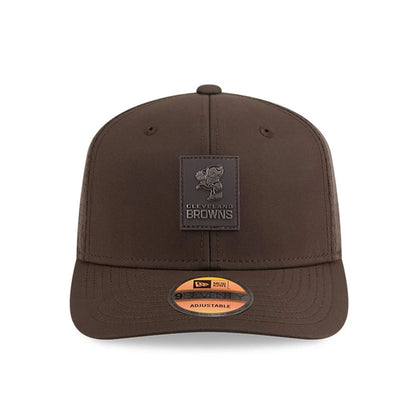 This is a Cleveland Browns NFL Sideline 2025 Dark Brown 9SEVENTY Trucker Stretch Snap Adjustable Cap 2