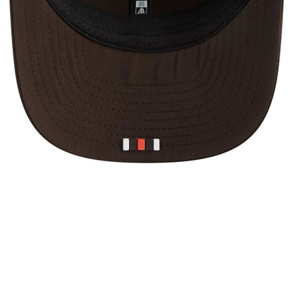 This is a Cleveland Browns NFL Sideline 2025 Dark Brown 9SEVENTY Trucker Stretch Snap Adjustable Cap 6