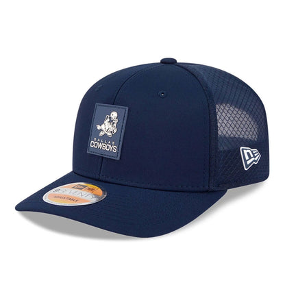 This is a Dallas Cowboys NFL Sideline 2025 Dark Blue 9SEVENTY Trucker Stretch Snap Adjustable Cap 1