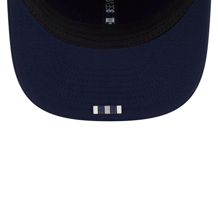 This is a Dallas Cowboys NFL Sideline 2025 Dark Blue 9SEVENTY Trucker Stretch Snap Adjustable Cap 2