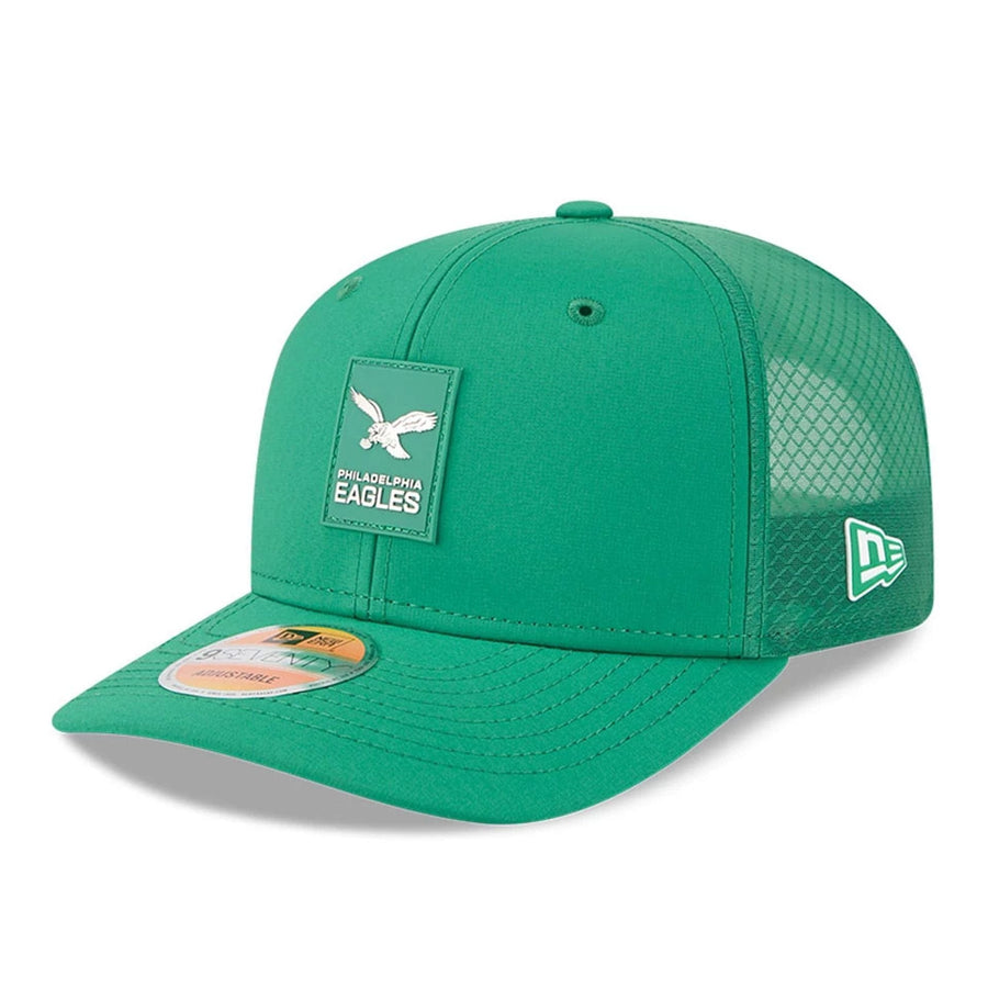 This is a Philadelphia Eagles NFL Sideline 2025 Green 9SEVENTY Trucker Stretch Snap Adjustable Cap 1