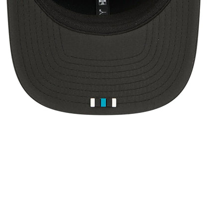 This is a Jacksonville Jaguars NFL Sideline 2025 Black 9SEVENTY Trucker Stretch Snap Adjustable Cap 2
