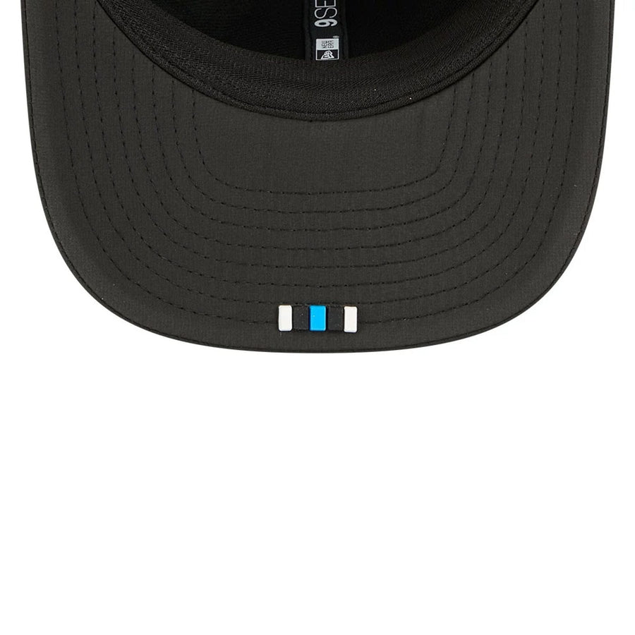 This is a Carolina Panthers NFL Sideline 2025 Black 9SEVENTY Trucker Stretch Snap Adjustable Cap 2