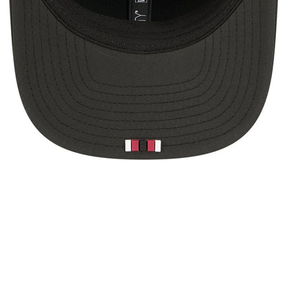 This is a Arizona Cardinals NFL Sideline 2025 Black 9SEVENTY Trucker Stretch Snap Adjustable Cap 2