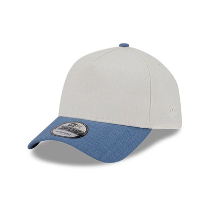 This is a New Era Earth Day White & Blue 9FORTY A-Frame Adjustable Cap 1