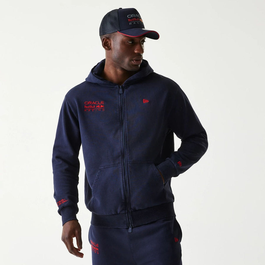The Male model is wearing Red Bull Racing Dark Blue Oversized Full Zip Hoodie 1