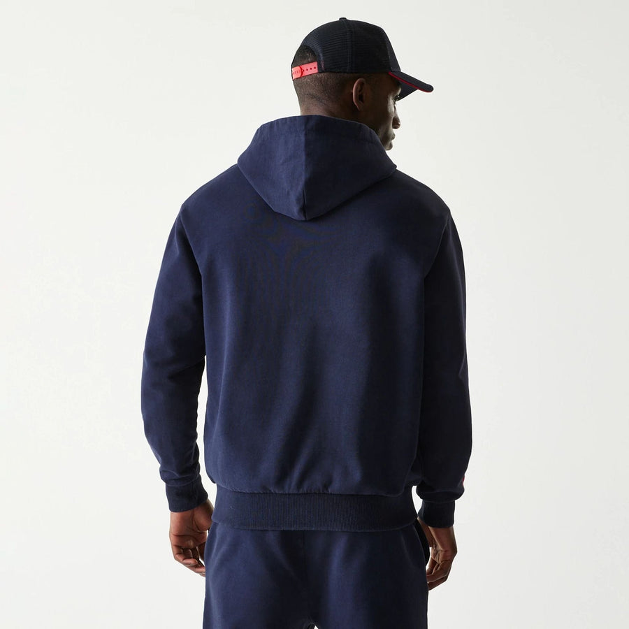 The Male model is wearing Red Bull Racing Dark Blue Oversized Full Zip Hoodie 2