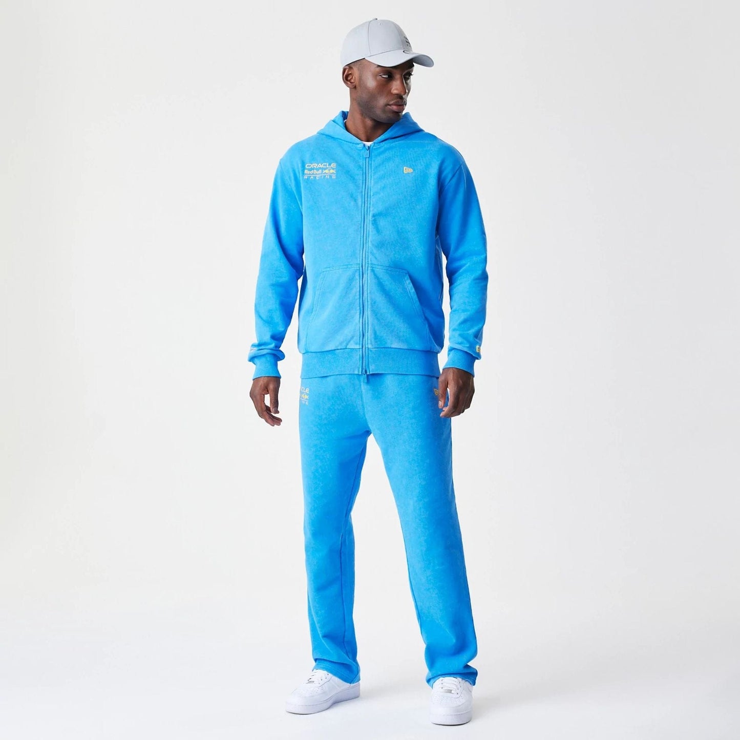 The Male model is wearing Red Bull Racing Blue Oversized Full Zip Hoodie 5