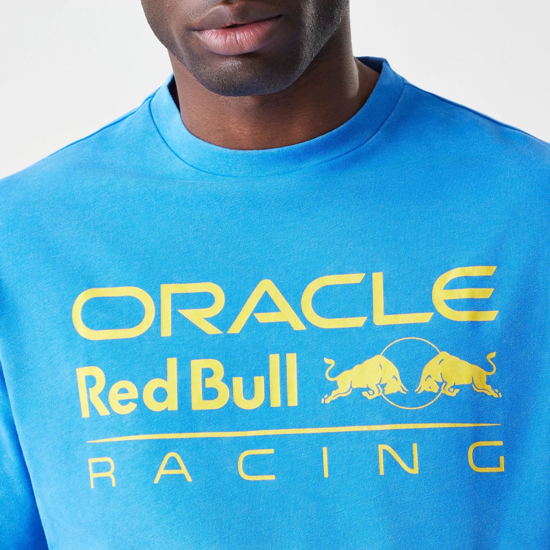 The Male model is wearing Red Bull Racing Blue Oversized T-Shirt 3