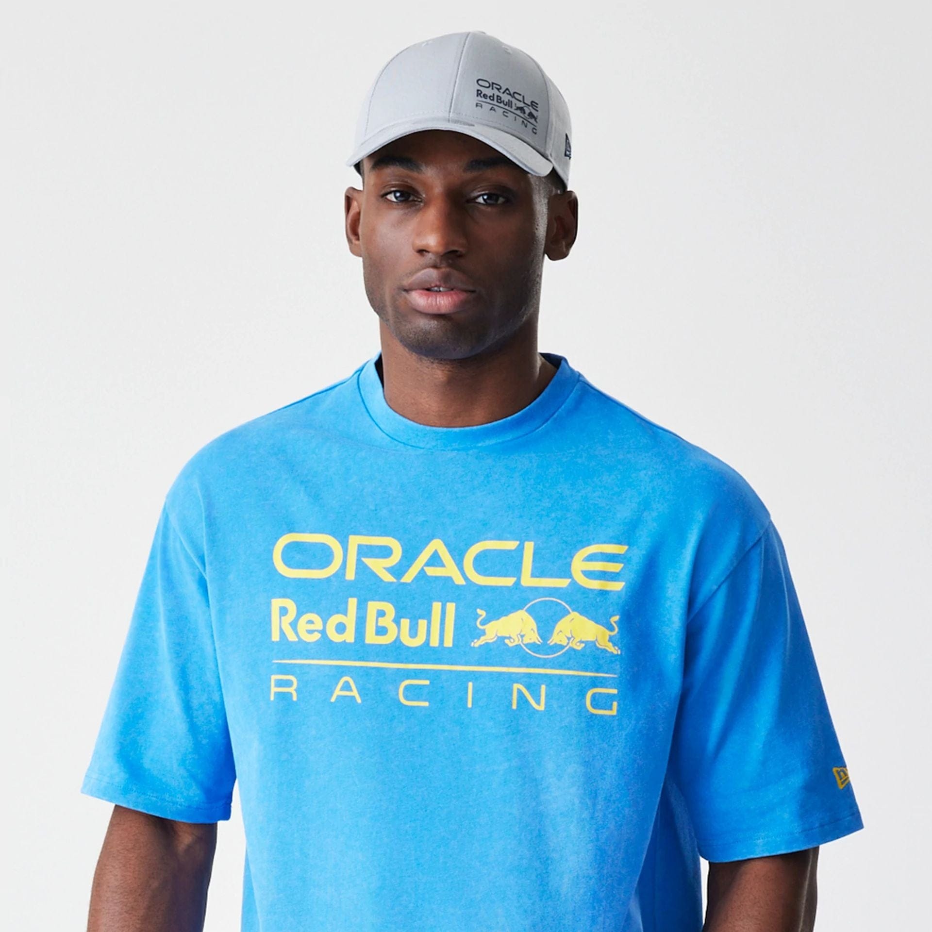 The Male model is wearing Red Bull Racing Blue Oversized T-Shirt 6