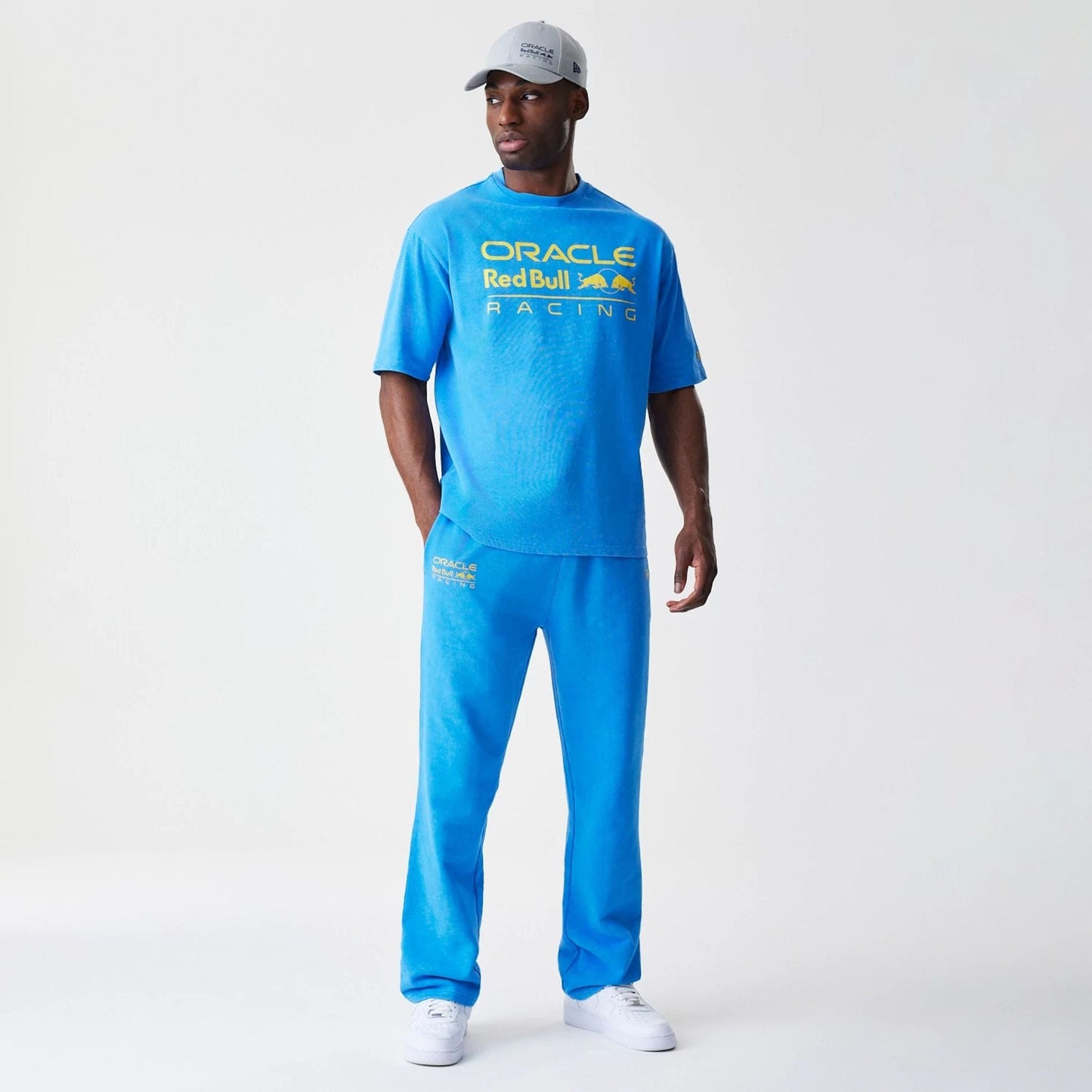 The Male model is wearing Red Bull Racing Blue Oversized T-Shirt 5