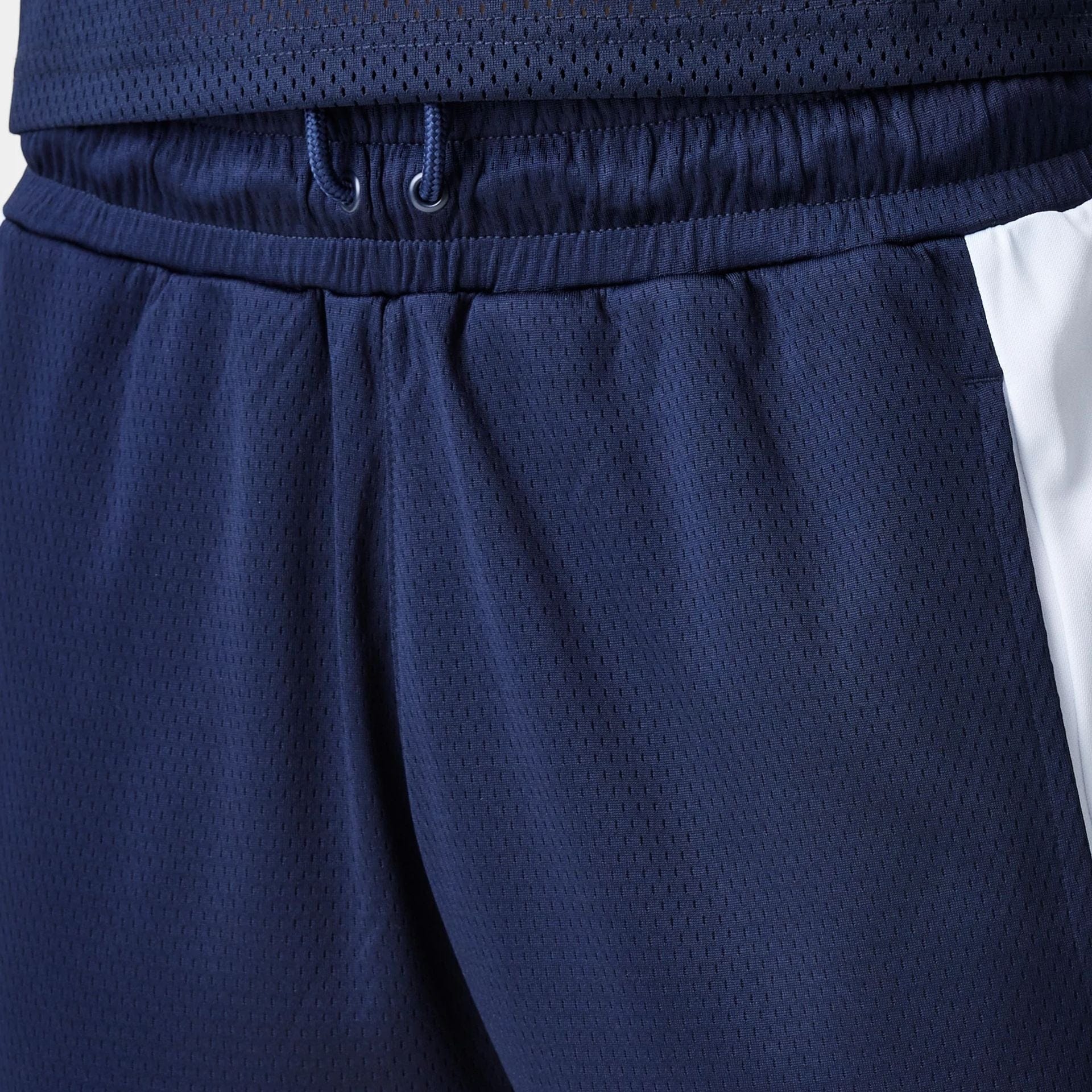 The Male model is wearing Red Bull Racing Graphic Mesh Dark Blue Shorts 6