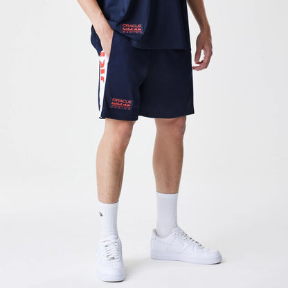 The Male model is wearing Red Bull Racing Graphic Mesh Dark Blue Shorts 1