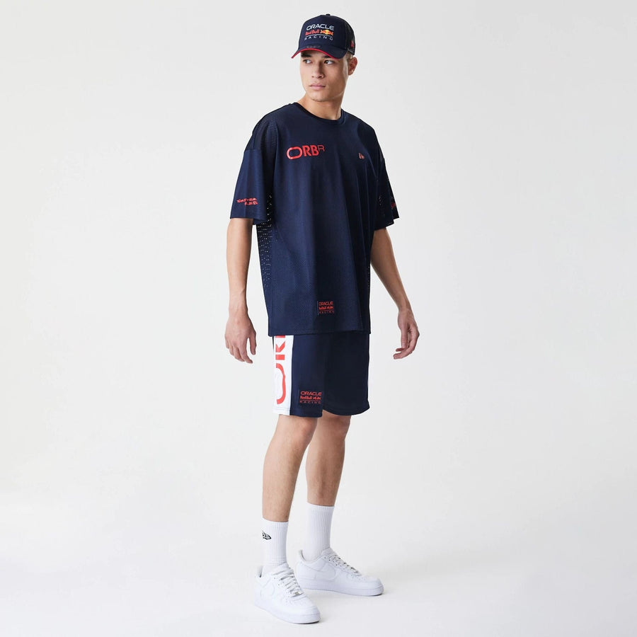 The Male model is wearing Red Bull Racing Graphic Mesh Dark Blue Shorts 8