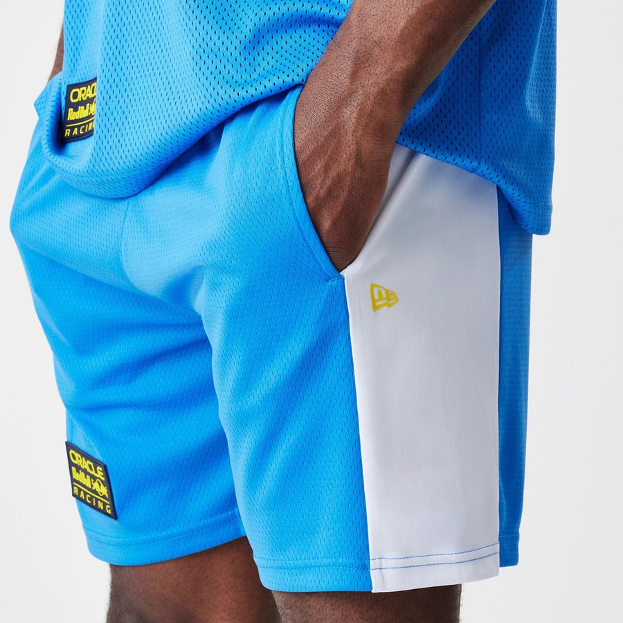 The Male model is wearing Red Bull Racing Graphic Mesh Blue Shorts 5