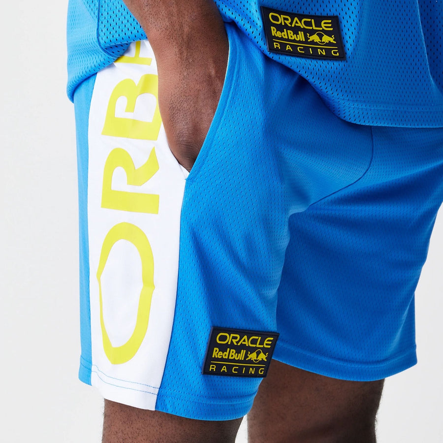 The Male model is wearing Red Bull Racing Graphic Mesh Blue Shorts 3