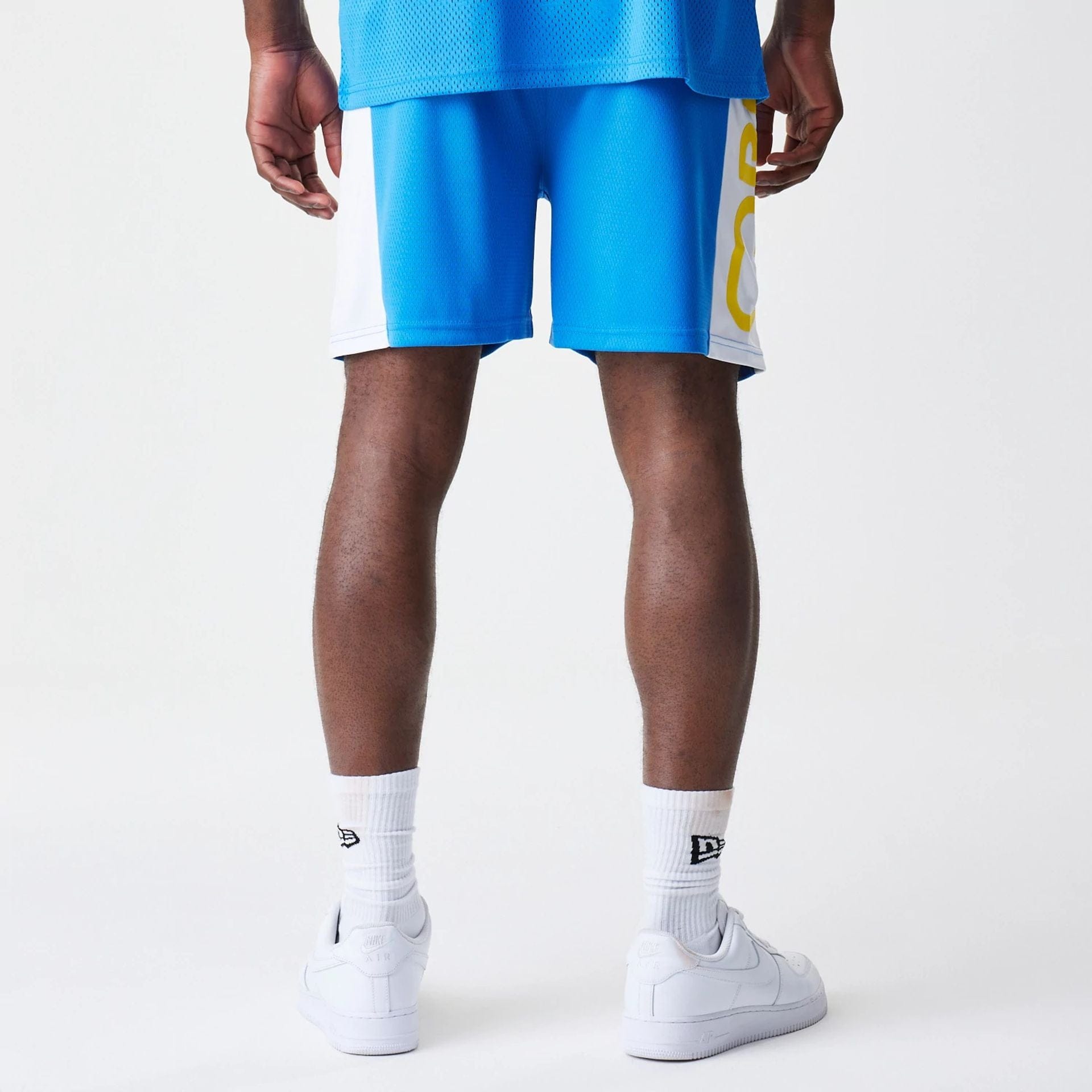 The Male model is wearing Red Bull Racing Graphic Mesh Blue Shorts 2