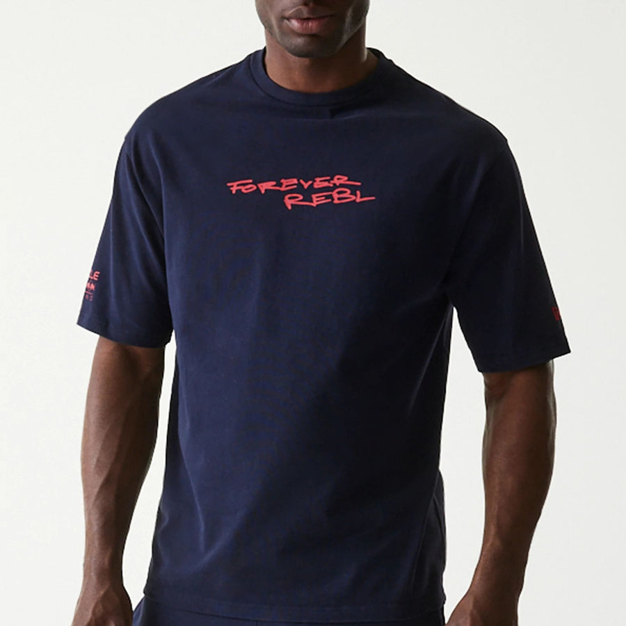 The Male model is wearing Red Bull Racing Back Graphic Dark Blue Oversized T-Shirt 3
