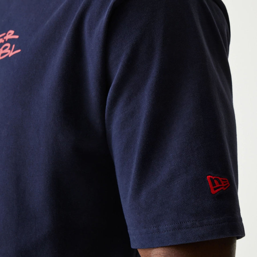 The Male model is wearing Red Bull Racing Back Graphic Dark Blue Oversized T-Shirt 7
