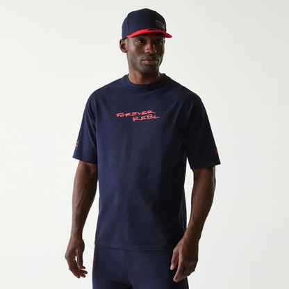 The Male model is wearing Red Bull Racing Back Graphic Dark Blue Oversized T-Shirt 1