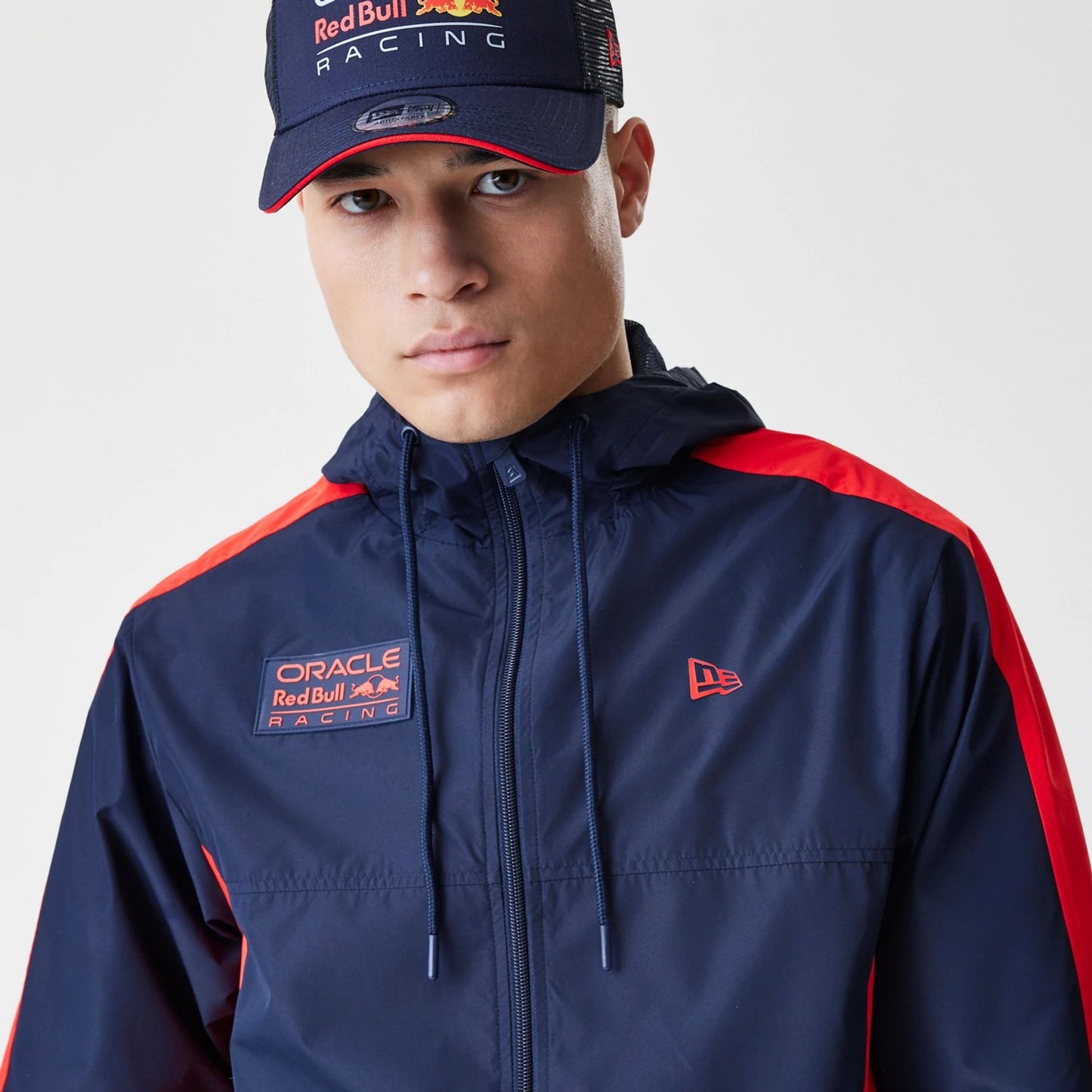 The Male model is wearing Red Bull Racing Dark Blue Windrunner Jacket 6