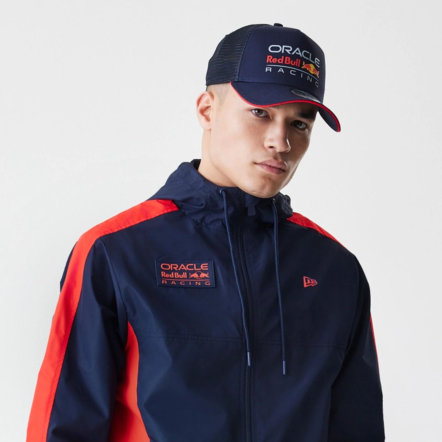 The Male model is wearing Red Bull Racing Dark Blue Windrunner Jacket 3
