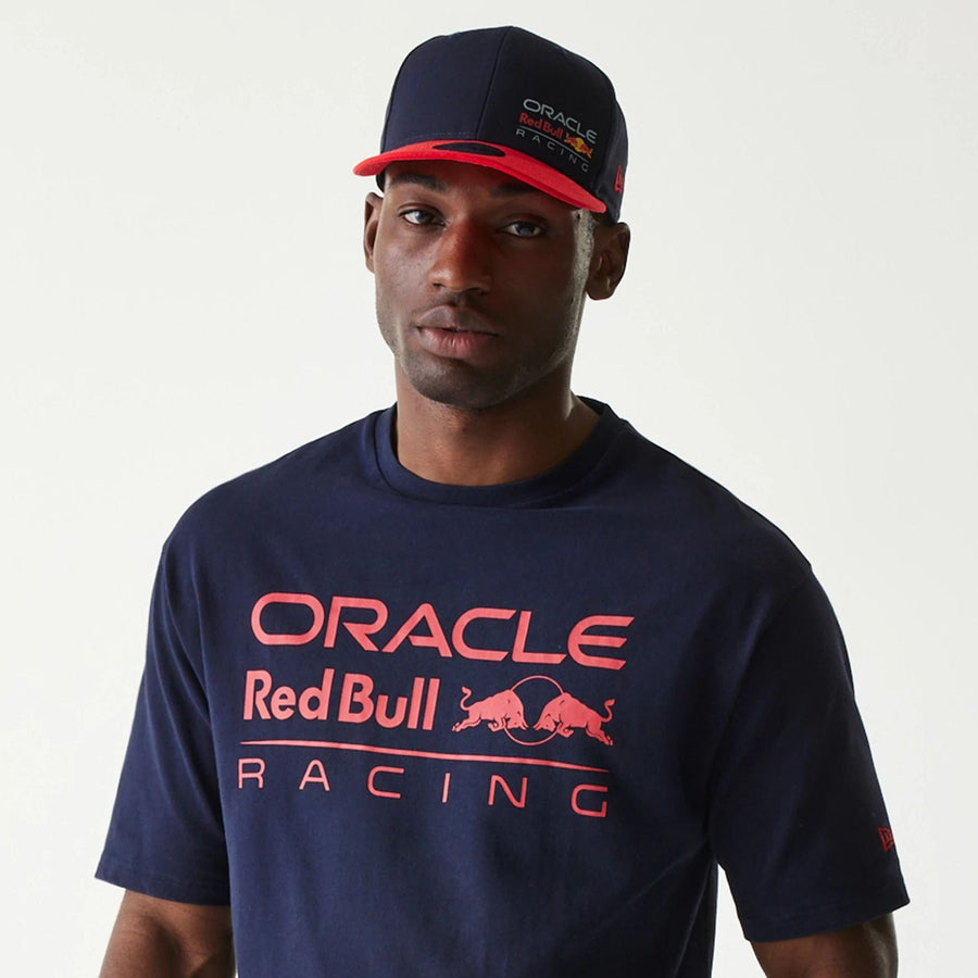 The Male model is wearing Red Bull Racing Dark Blue Oversized T-Shirt 6