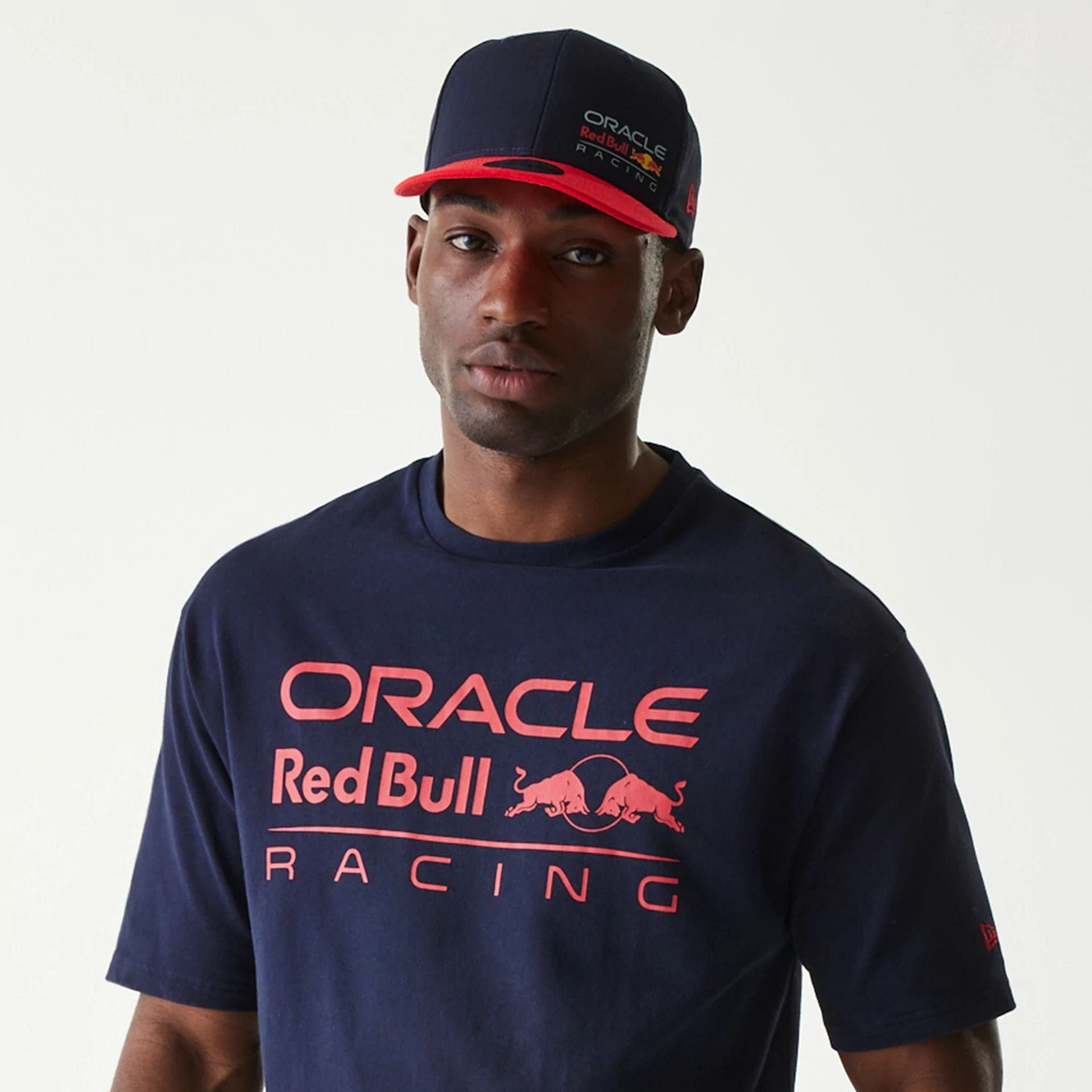 The Male model is wearing Red Bull Racing Dark Blue Oversized T-Shirt 6