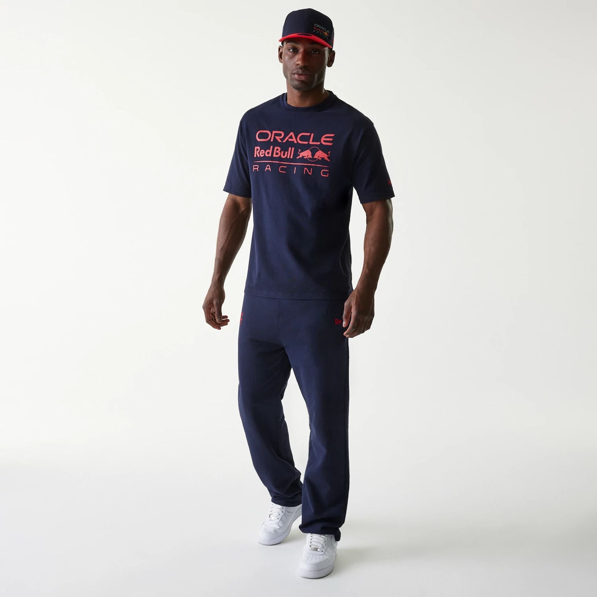 The Male model is wearing Red Bull Racing Dark Blue Oversized T-Shirt 8