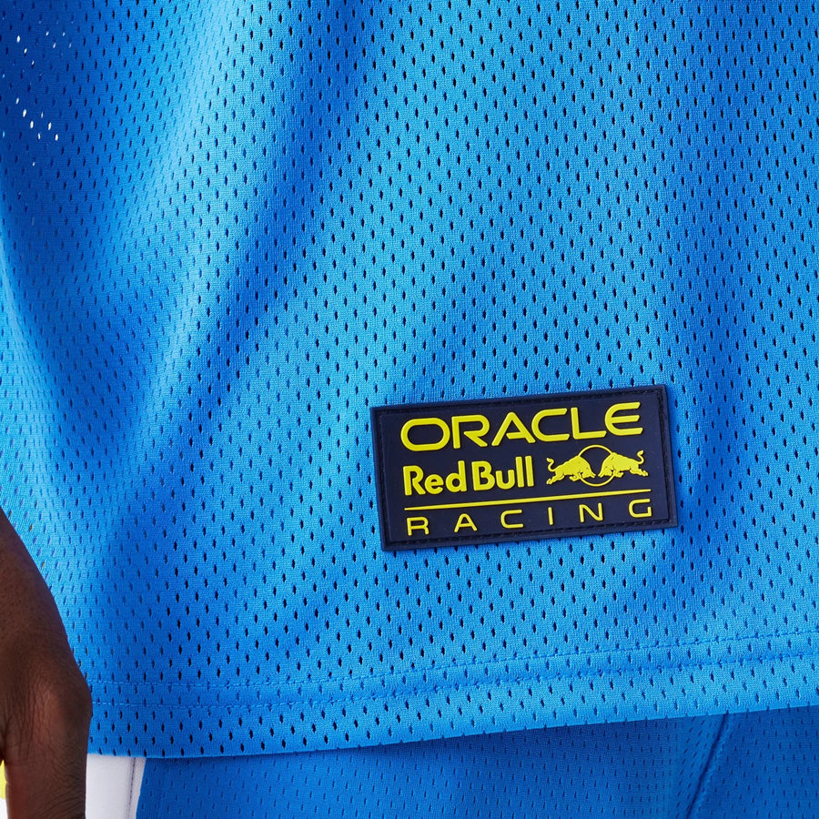 The Male model is wearing Red Bull Racing Graphic Mesh Blue Oversized T-Shirt 5