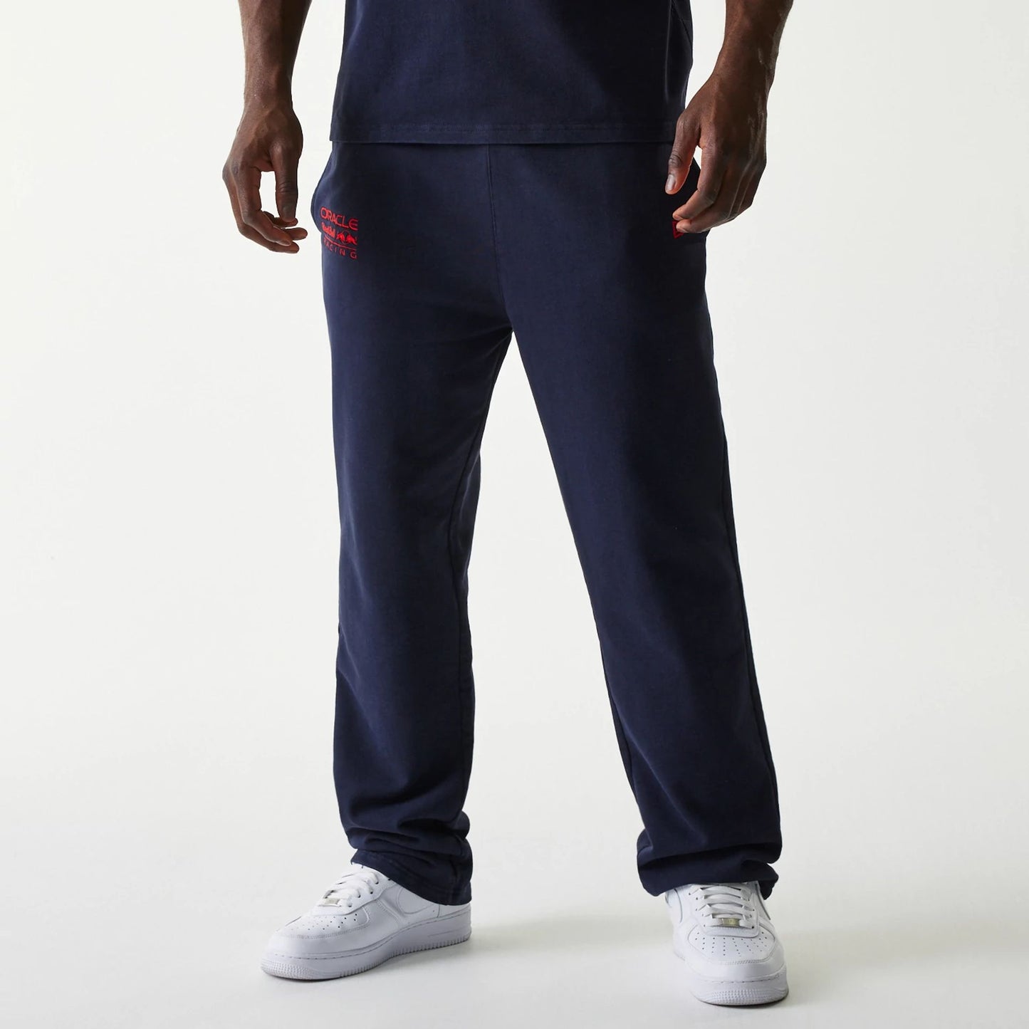 The Male model is wearing Red Bull Racing Dark Blue Joggers 1