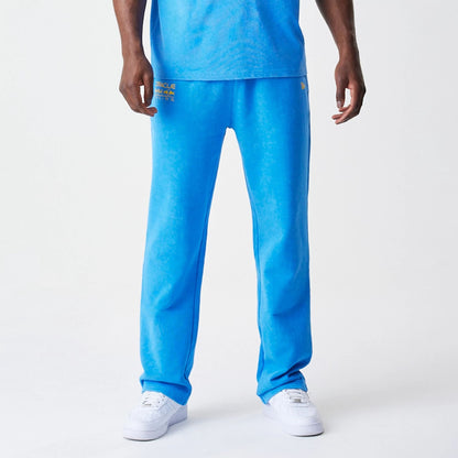 The Male model is wearing Red Bull Racing Blue Joggers 7