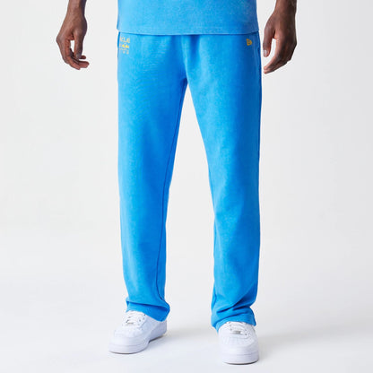 The Male model is wearing Red Bull Racing Blue Joggers 1